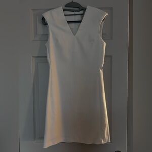 White dress with padded shoulders